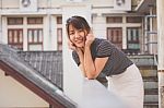 Portrait Of Thai Adult Beautiful Girl Relax And Smile Stock Photo