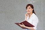 Portrait Of Thai Adult Businesswoman Beautiful Girl Read A Book Stock Photo