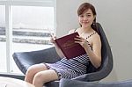 Portrait Of Thai Adult Businesswoman Beautiful Girl Read A Book Stock Photo