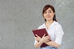 Portrait Of Thai Adult Businesswoman Beautiful Girl Read A Book Stock Photo