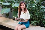 Portrait Of Thai Adult Businesswoman Beautiful Girl Read A Book Stock Photo