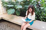 Portrait Of Thai Adult Businesswoman Beautiful Girl Read A Book Stock Photo