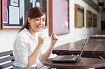 Portrait Of Thai Adult Businesswoman Beautiful Girl Using Computer Notebook Stock Photo