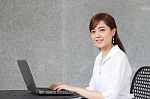 Portrait Of Thai Adult Businesswoman Beautiful Girl Using Computer Notebook Stock Photo