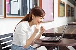 Portrait Of Thai Adult Businesswoman Beautiful Girl Using Computer Notebook Stock Photo