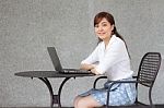 Portrait Of Thai Adult Businesswoman Beautiful Girl Using Computer Notebook Stock Photo