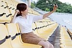 Portrait Of Thai Adult Businesswoman Beautiful Girl Using Her Smart Phone Selfie Stock Photo