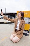 Portrait Of Thai Adult Businesswoman Beautiful Girl Using Her Smart Phone Selfie Stock Photo