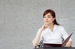 Portrait Of Thai Adult Businesswoman Beautiful Girl Write A Book Stock Photo