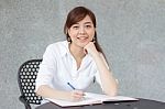 Portrait Of Thai Adult Businesswoman Beautiful Girl Write A Book Stock Photo