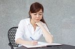 Portrait Of Thai Adult Businesswoman Beautiful Girl Write A Book Stock Photo