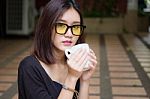 Portrait Of Thai Adult Glasses Beautiful Girl Drinking Coffee Stock Photo