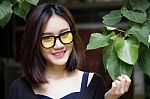 Portrait Of Thai Adult Glasses Beautiful Girl Relax And Smile Stock Photo