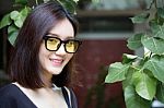 Portrait Of Thai Adult Glasses Beautiful Girl Relax And Smile Stock Photo