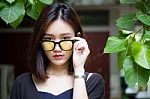 Portrait Of Thai Adult Glasses Beautiful Girl Relax And Smile Stock Photo