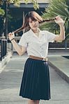 Portrait Of Thai Adult Student University Uniform Beautiful Girl Relax And Smile Stock Photo