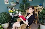 Portrait Of Thai Adult Women Office Beautiful Girl Reading Book Stock Photo