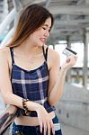 Portrait Of Thai Chinese Adult Beautiful Girl Denim Blue Bag Credit Card Stock Photo