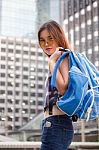 Portrait Of Thai Chinese Adult Beautiful Girl Denim Blue Bag Travel Relax And Smile Stock Photo