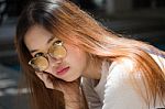 Portrait Of Thai Chinese Adult Glasses Beautiful Girl Denim Blue Bag Relax And Smile Stock Photo