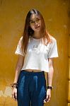 Portrait Of Thai Chinese Adult Glasses Beautiful Girl Denim Blue Bag Relax And Smile Stock Photo