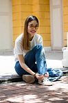 Portrait Of Thai Chinese Adult Glasses Beautiful Girl Denim Blue Bag Relax And Smile Stock Photo