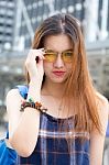 Portrait Of Thai Chinese Adult Glasses Beautiful Girl Denim Blue Bag Relax And Smile Stock Photo