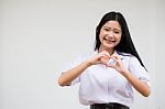 Portrait Of Thai High School Student Uniform Beautiful Girl Give Heart Stock Photo