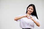 Portrait Of Thai High School Student Uniform Beautiful Girl Give Heart Stock Photo