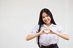 Portrait Of Thai High School Student Uniform Beautiful Girl Give Heart Stock Photo