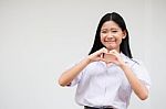 Portrait Of Thai High School Student Uniform Beautiful Girl Give Heart Stock Photo