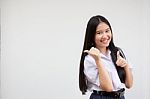 Portrait Of Thai High School Student Uniform Beautiful Girl Pointing Stock Photo