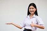 Portrait Of Thai High School Student Uniform Beautiful Girl Show Hand Stock Photo