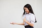 Portrait Of Thai High School Student Uniform Beautiful Girl Show Hand Stock Photo