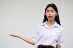 Portrait Of Thai High School Student Uniform Beautiful Girl Show Hand Stock Photo