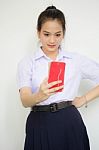 Portrait Of Thai High School Student Uniform Beautiful Girl Using Her Smart Phone Selfie Stock Photo