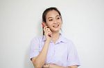 Portrait Of Thai High School Student Uniform Teen Beautiful Girl Calling Smart Phone, Stock Photo