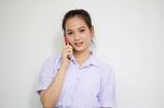 Portrait Of Thai High School Student Uniform Teen Beautiful Girl Calling Smart Phone, Stock Photo