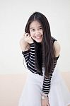 Portrait Of Thai Student Teen Beautiful Girl Relax And Smile Stock Photo