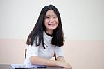 Portrait Of Thai Student Teen Beautiful Girl Relax And Smile Stock Photo