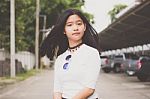 Portrait Of Thai Student Teen Beautiful Girl Relax And Smile Stock Photo