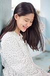 Portrait Of Thai Student Teen Beautiful Girl Relax And Smile Stock Photo