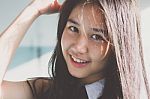 Portrait Of Thai Student Teen Beautiful Girl Relax And Smile Stock Photo