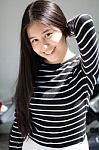 Portrait Of Thai Student Teen Beautiful Girl Relax And Smile Stock Photo