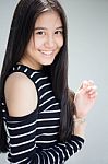 Portrait Of Thai Student Teen Beautiful Girl Relax And Smile Stock Photo