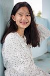 Portrait Of Thai Student Teen Beautiful Girl Relax And Smile Stock Photo