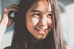 Portrait Of Thai Student Teen Beautiful Girl Relax And Smile Stock Photo