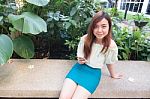 Portrait Of Thai Student University Beautiful Girl Using Her Smart Phone Stock Photo