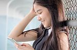 Portrait Of Thai Teen Beautiful Girl Calling Smart Phone Stock Photo