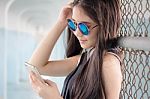 Portrait Of Thai Teen Beautiful Girl Calling Smart Phone Stock Photo